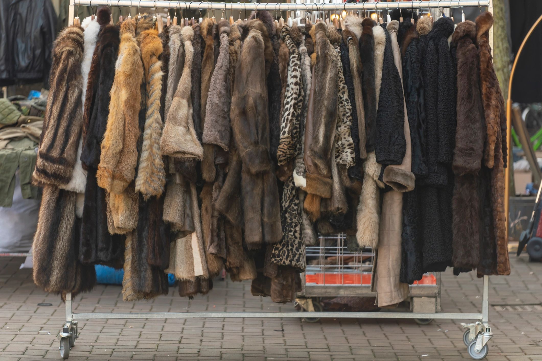 Vintage coats on a clothing rack